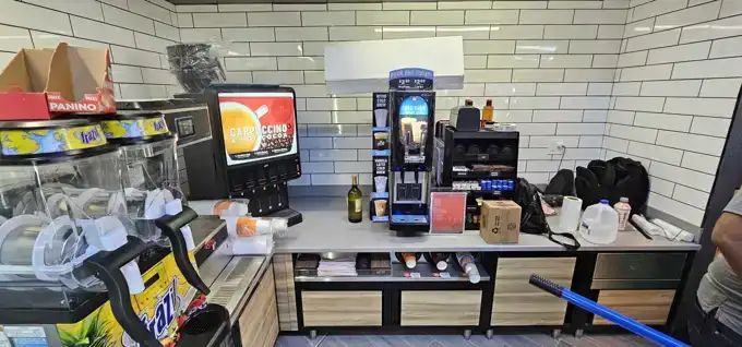 Food-service counter energized — dedicated GFCI circuits per appliance.