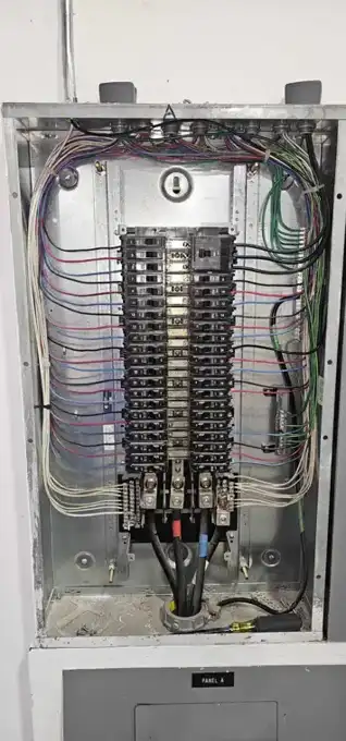 Upgraded 42-space distribution panel — every circuit labelled and dressed.