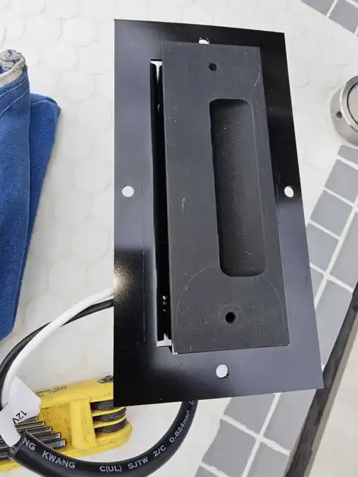 Custom low-voltage LED housings we fabricated on site.